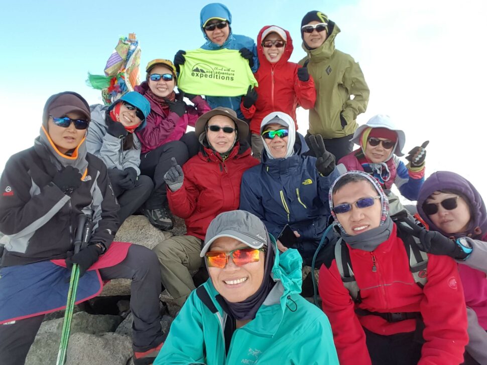 Joanne and other mountaineers at Malchin Peak in Mongolia